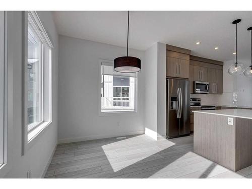 801-335 Creekside Boulevard Sw, Calgary, AB - Indoor Photo Showing Kitchen With Upgraded Kitchen