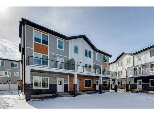 801-335 Creekside Boulevard Sw, Calgary, AB - Outdoor With Balcony With Facade