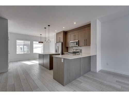 802-335 Creekside Boulevard Sw, Calgary, AB - Indoor Photo Showing Kitchen With Upgraded Kitchen