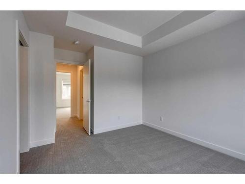 802-335 Creekside Boulevard Sw, Calgary, AB - Indoor Photo Showing Other Room