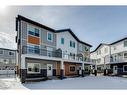802-335 Creekside Boulevard Sw, Calgary, AB  - Outdoor With Balcony With Facade 