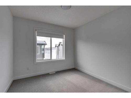 802-335 Creekside Boulevard Sw, Calgary, AB - Indoor Photo Showing Other Room