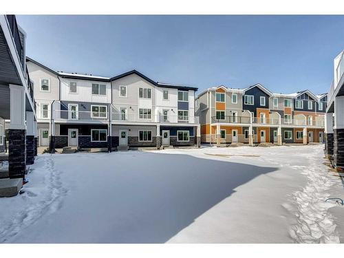 802-335 Creekside Boulevard Sw, Calgary, AB - Outdoor With Balcony With Facade