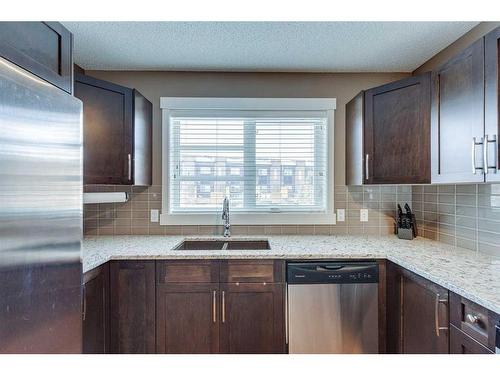 237 Covecreek Circle Ne, Calgary, AB - Indoor Photo Showing Kitchen With Double Sink
