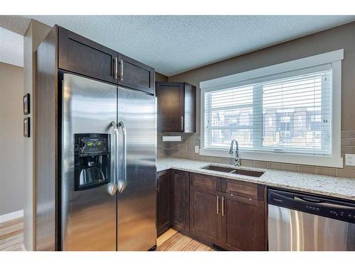 237 Covecreek Circle Ne, Calgary, AB - Indoor Photo Showing Kitchen With Double Sink