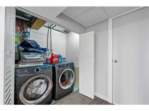 10 Millrise Green Sw, Calgary, AB - Indoor Photo Showing Laundry Room