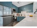 10 Millrise Green Sw, Calgary, AB  - Indoor Photo Showing Kitchen With Upgraded Kitchen 