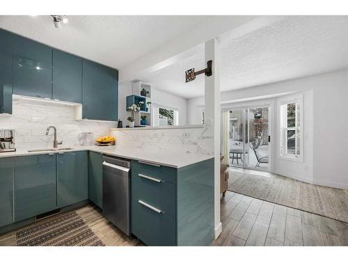 10 Millrise Green Sw, Calgary, AB - Indoor Photo Showing Kitchen With Upgraded Kitchen