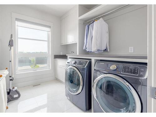 125 Aspen Ridge Heights Sw, Calgary, AB - Indoor Photo Showing Laundry Room