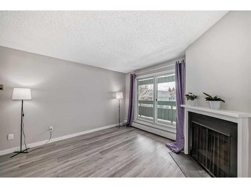 5310-315 Southampton Drive Sw, Calgary, AB - Indoor With Fireplace