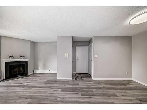 5310-315 Southampton Drive Sw, Calgary, AB - Indoor With Fireplace