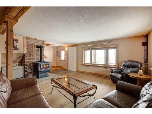 295024 Twp Rd 154, Rural Willow Creek No. 26, M.D. Of, AB - Indoor Photo Showing Living Room With Fireplace