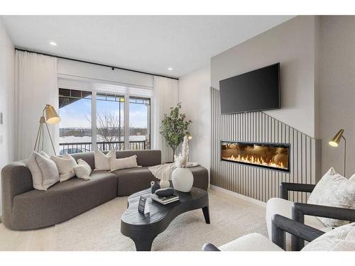 536 Legacy Circle Se, Calgary, AB - Indoor Photo Showing Living Room With Fireplace