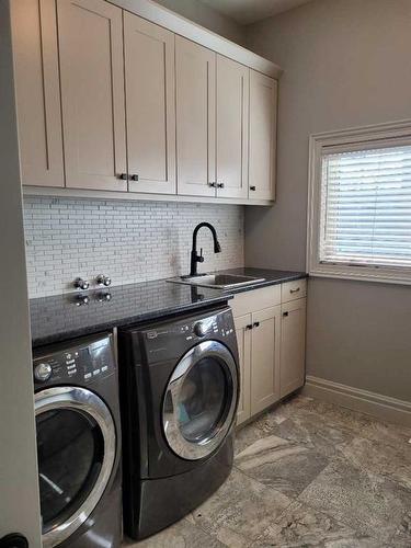 116 Posthill Drive Sw, Calgary, AB - Indoor Photo Showing Laundry Room