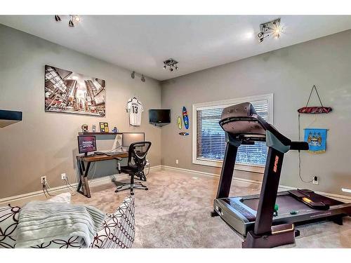 116 Posthill Drive Sw, Calgary, AB - Indoor Photo Showing Gym Room