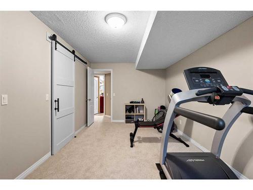 755 Hawkside Mews Nw, Calgary, AB - Indoor Photo Showing Gym Room
