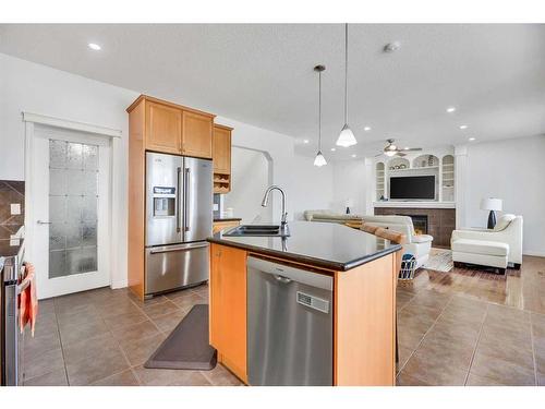133 Everwoods Court Sw, Calgary, AB - Indoor Photo Showing Kitchen With Stainless Steel Kitchen With Double Sink