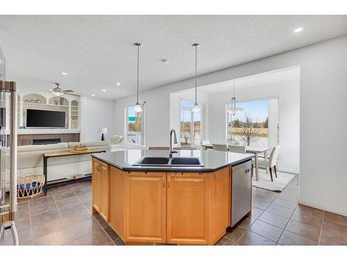 133 Everwoods Court Sw, Calgary, AB - Indoor Photo Showing Kitchen With Double Sink