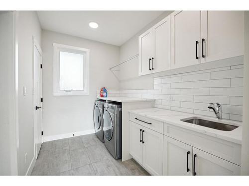 5103 18 Avenue Nw, Calgary, AB - Indoor Photo Showing Laundry Room