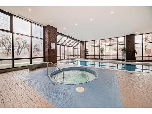 502D-500 Eau Claire Avenue Sw, Calgary, AB - Indoor Photo Showing Other Room With In Ground Pool