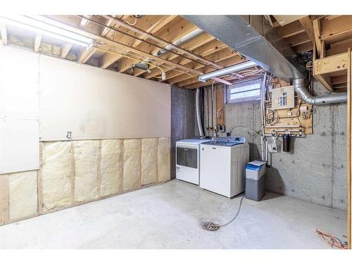 7 Deerbow Place Se, Calgary, AB - Indoor Photo Showing Basement