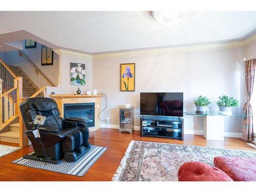 940 40 Street Sw, Calgary, AB - Indoor Photo Showing Living Room With Fireplace