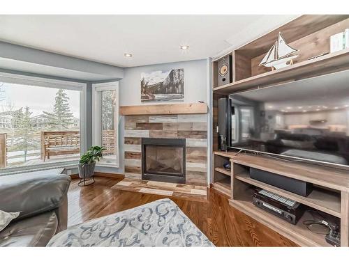 92 Douglas Woods Grove Se, Calgary, AB - Indoor Photo Showing Living Room With Fireplace