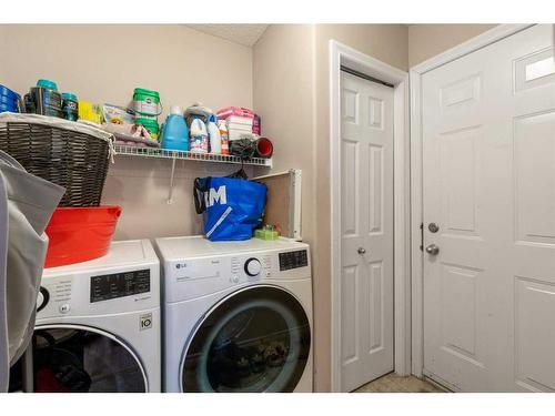 42 Crestmont Drive, Calgary, AB - Indoor Photo Showing Laundry Room