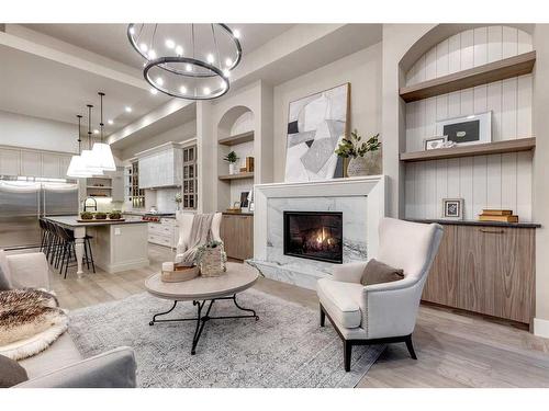 1122 Bellevue Avenue Se, Calgary, AB - Indoor Photo Showing Living Room With Fireplace