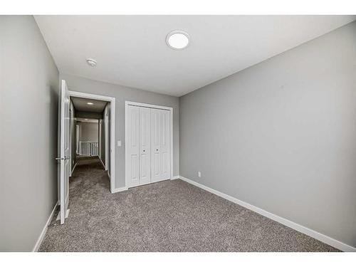 199 Lucas Close Nw, Calgary, AB - Indoor Photo Showing Other Room