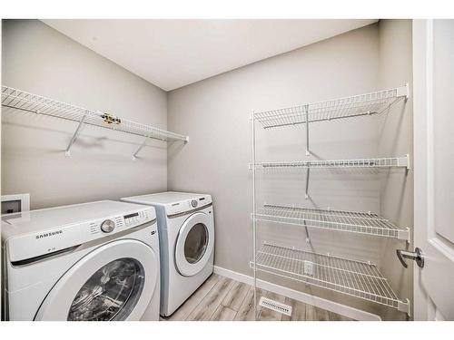199 Lucas Close Nw, Calgary, AB - Indoor Photo Showing Laundry Room