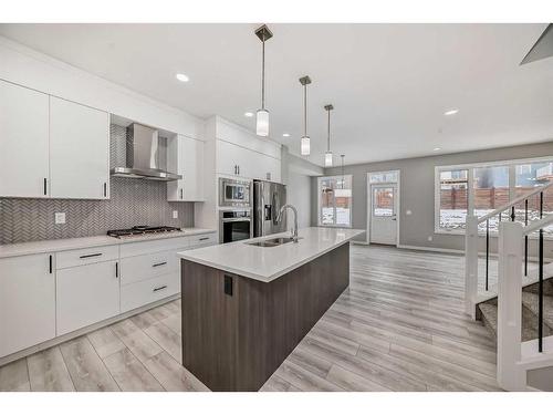 199 Lucas Close Nw, Calgary, AB - Indoor Photo Showing Kitchen With Double Sink With Upgraded Kitchen