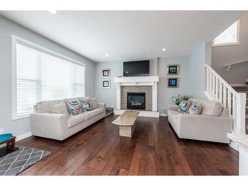 367 Chaparral Valley Way Se, Calgary, AB - Indoor Photo Showing Living Room With Fireplace