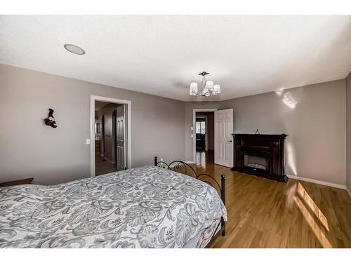 16 Valley Crest Gardens Nw, Calgary, AB - Indoor Photo Showing Bedroom