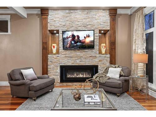 2031 5 Avenue Nw, Calgary, AB - Indoor Photo Showing Living Room With Fireplace