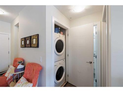 211-4 Sage Hill Terrace Nw, Calgary, AB - Indoor Photo Showing Laundry Room