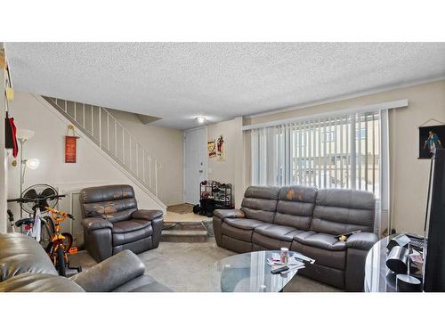 11-3809 45 Street Sw, Calgary, AB - Indoor Photo Showing Living Room