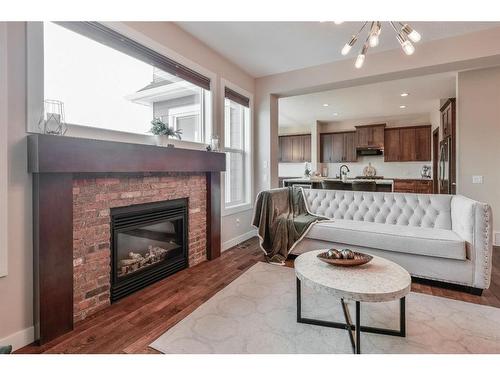 654 Marina Drive, Chestermere, AB - Indoor Photo Showing Living Room With Fireplace