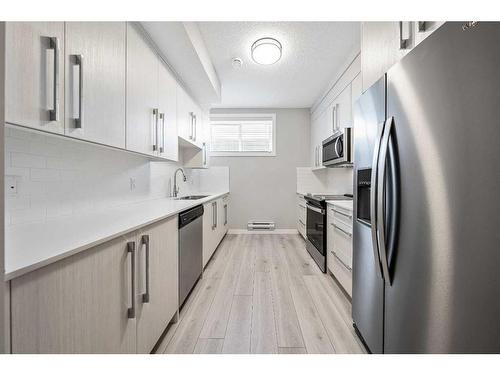 529 Walgrove Boulevard Se, Calgary, AB - Indoor Photo Showing Kitchen With Stainless Steel Kitchen