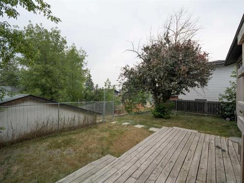 572 Parkridge Drive Se, Calgary, AB - Outdoor With Deck Patio Veranda With Backyard