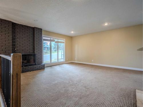 572 Parkridge Drive Se, Calgary, AB - Indoor With Fireplace