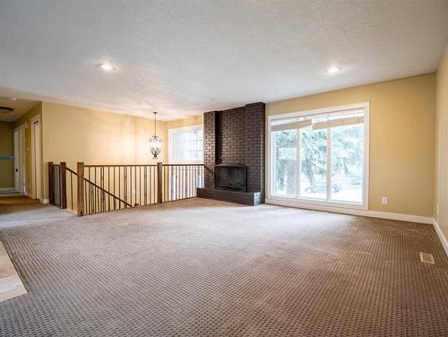 572 Parkridge Drive Se, Calgary, AB - Indoor With Fireplace