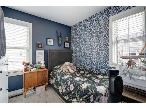 1704-32 Horseshoe Crescent, Cochrane, AB - Indoor Photo Showing Bedroom