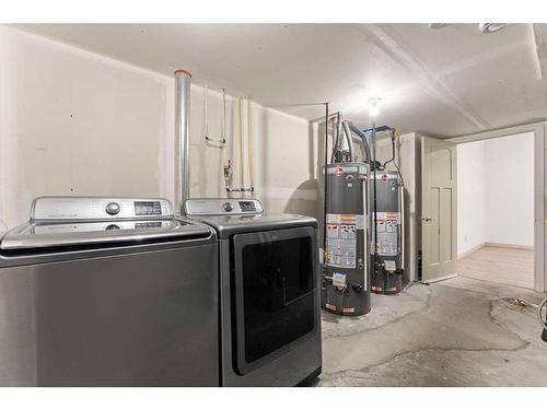 223 Saddlecreek Court Ne, Calgary, AB - Indoor Photo Showing Laundry Room