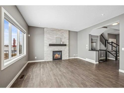 641 Edgefield Gate, Strathmore, AB - Indoor Photo Showing Living Room With Fireplace