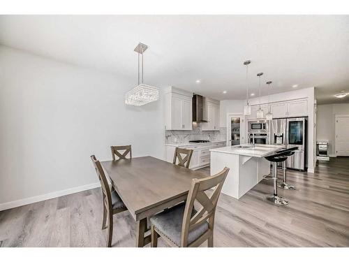 208 Dawson Harbour Heights, Chestermere, AB - Indoor Photo Showing Dining Room