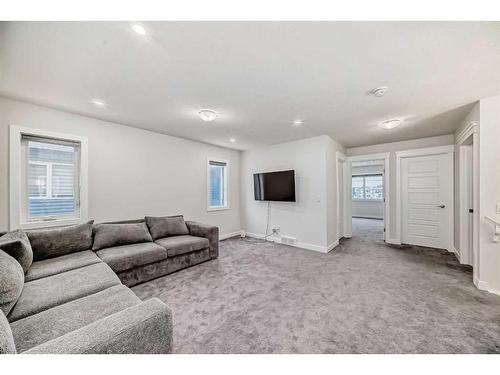 208 Dawson Harbour Heights, Chestermere, AB - Indoor Photo Showing Living Room