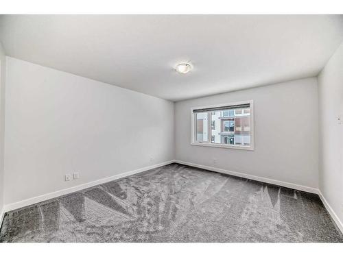 208 Dawson Harbour Heights, Chestermere, AB - Indoor Photo Showing Other Room