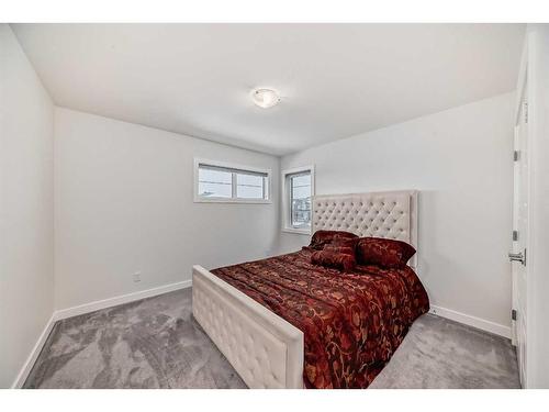 208 Dawson Harbour Heights, Chestermere, AB - Indoor Photo Showing Bedroom