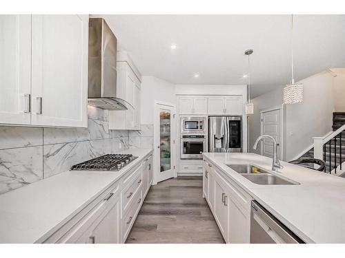 208 Dawson Harbour Heights, Chestermere, AB - Indoor Photo Showing Kitchen With Double Sink With Upgraded Kitchen